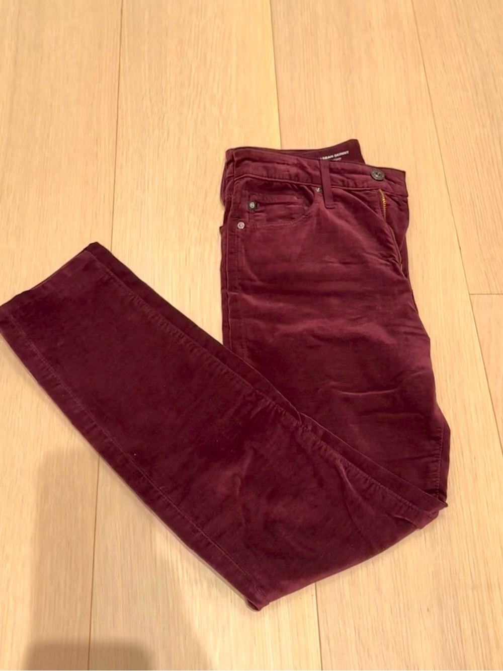 AG Corduroy Jeans in Deep Burgundy
